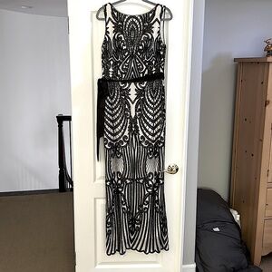 Beautiful full length dress.Underlay is a soft cream /overlay design in sequins.